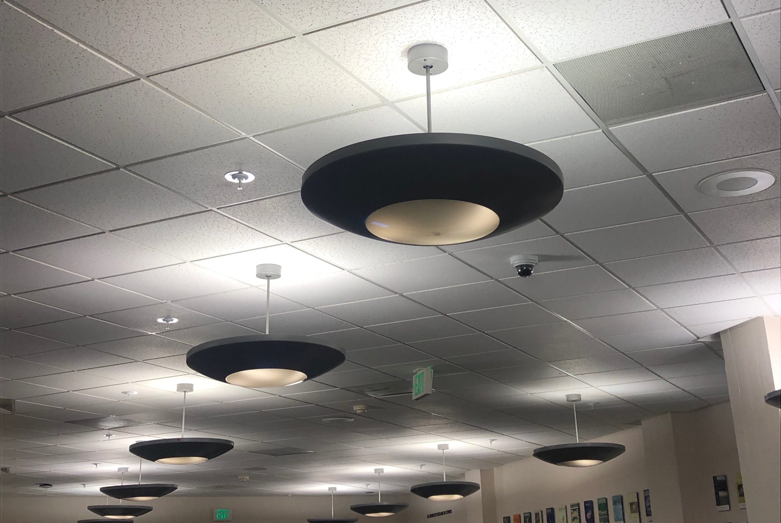 Standard white square office ceiling tiles.