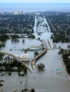 Ariel photograph of New Orleans in the aftermath of Hurricane Katrina. The highways and side streets are flooded.