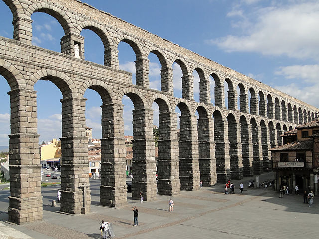 Stone wall made up of two levels of thin arches