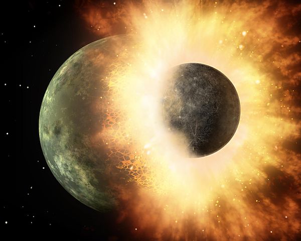 The Earth and a Mars-sized object are colliding in a giant explosion.