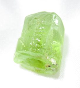 Light green, glassy crystal of olivine.