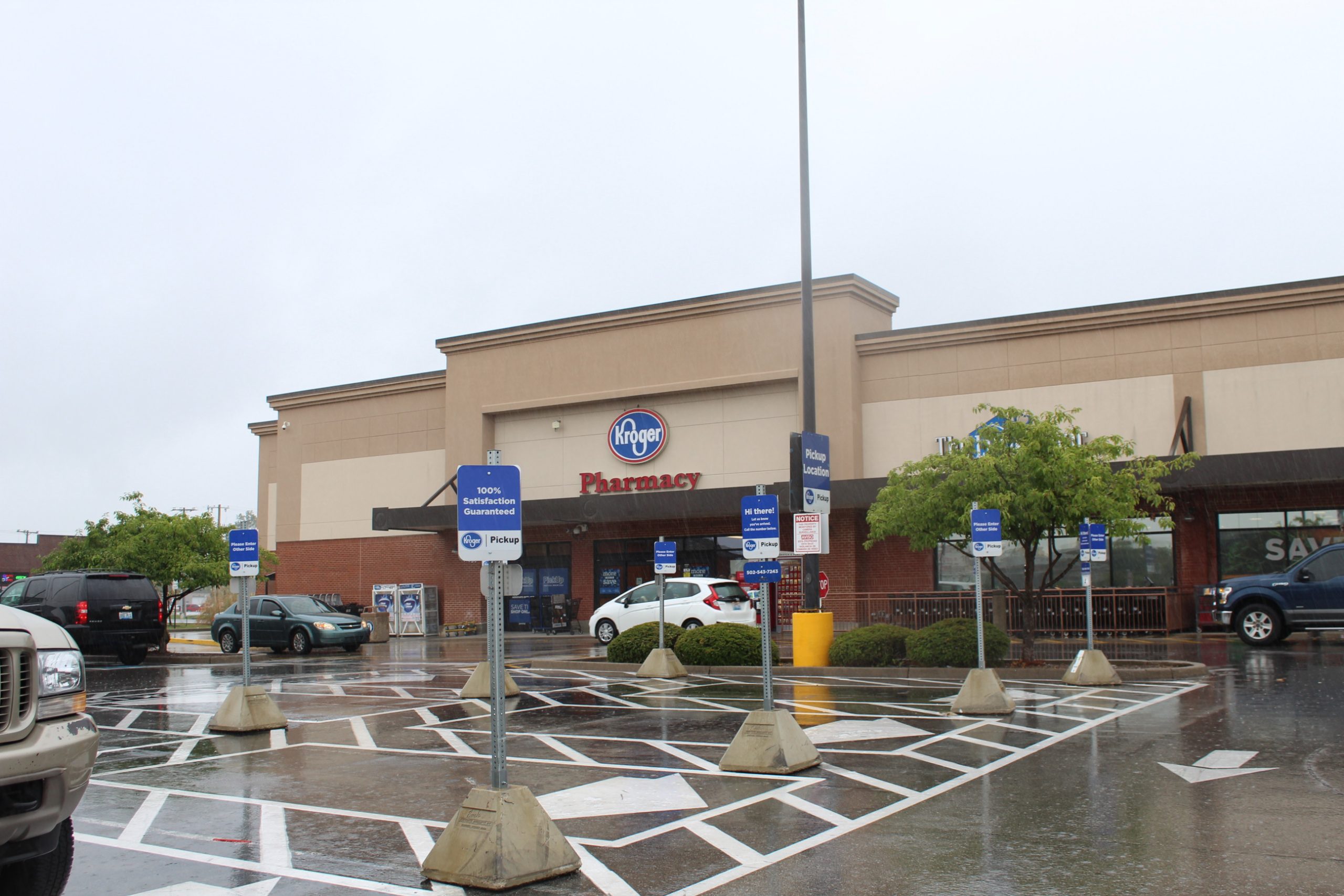 Kroger parking lot with specific parking spots that have signage for Kroger pickup