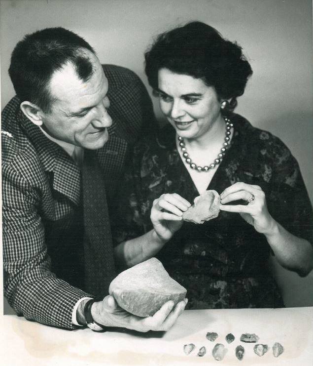 Ralph and Rose Solecki holding stone artifacts