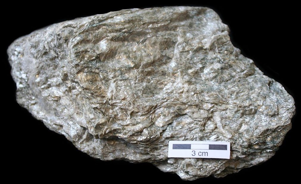 Schist is a scalely looking foliated metamorphic rock.