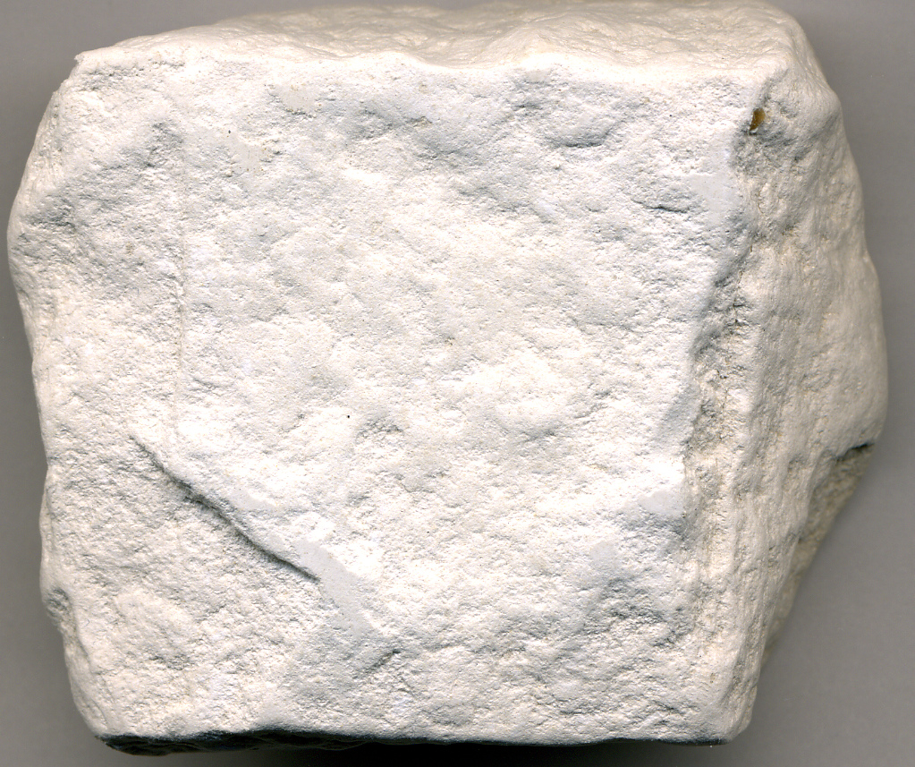 Chunk of white, fine-grained, powdery-looking rock.