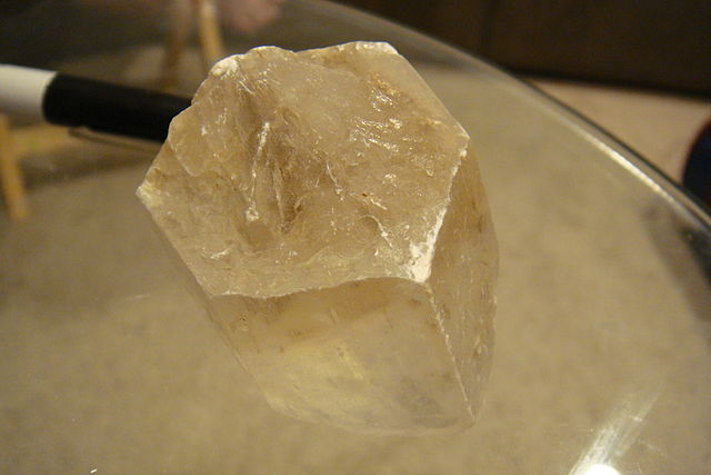 The mineral is hexagonal and clear.